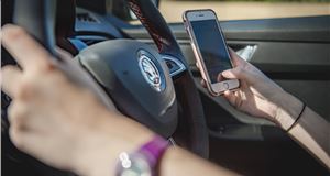 Mobile phone use behind the wheel is on the decline