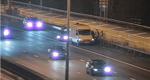 Family caught cooking a meal on hard shoulder of M25