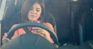 Drivers should be banned from using hands-free phones, say MPs