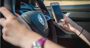 You'll soon be fined for touching your phone while driving