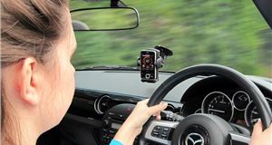 Hands-free phones should be banned, says road safety charity 