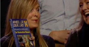 Even Mrs B. is Plugging the Wheeler Dealers book