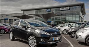 Ford price cuts help boost sales